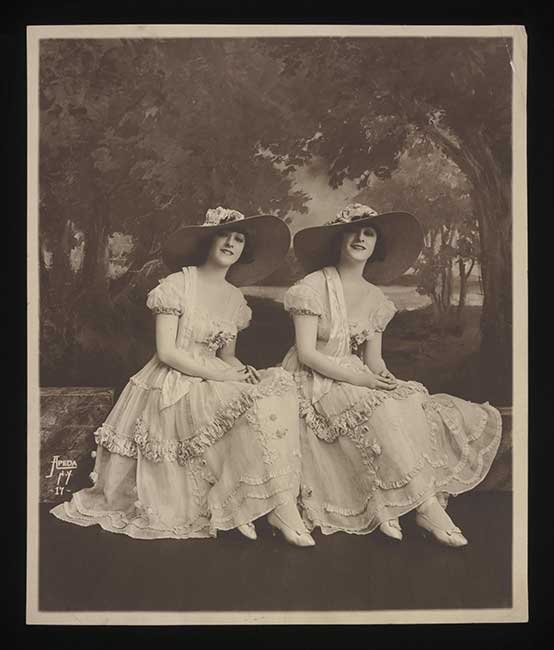 Photographic portrait of the dancers and actresses, known as 'The Dolly Sisters,' Rose 'Rosie' Dolly (1892-1970) and Jenny Dolly (1892-1941), Apeda, New York, 1917.